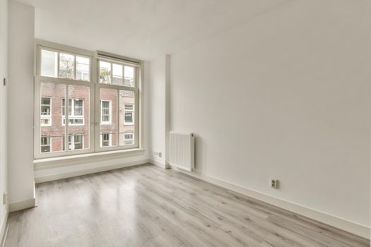 Interior of empty room with wide windows