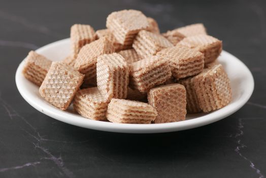 cube shape wafer biscuit on plate