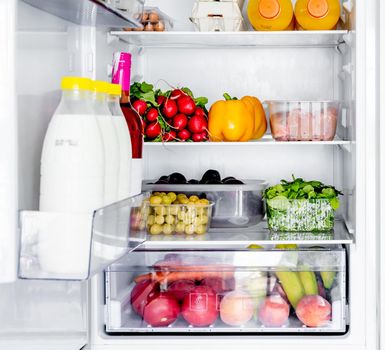 Fridge with fruits and vegetables
