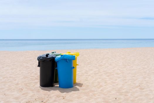 Clean beach garbage bins.