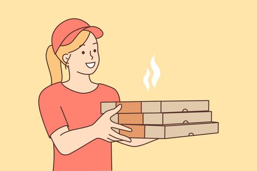 Female courier with pizza boxes