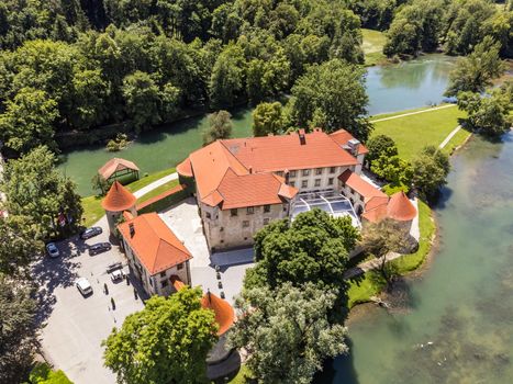 Romantic Otocec Castle on Krka River in Slovenia. Drone View.