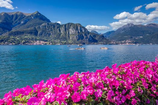 Tremezzo Village and mountain on Lake Como from Bellagio at sunset, Italy