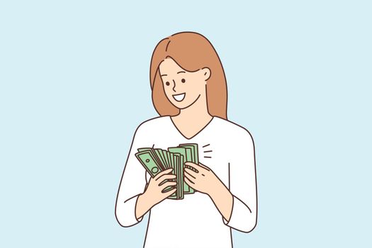 Smiling woman with cash excited with income