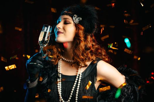 Portrait of vintage styled woman dressed in Great Gatsby era dancing under confetti rain on velours background. Roaring twenties, retro, party, fashion concept