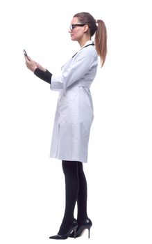 serious woman doctor communicating with a patient via video link.