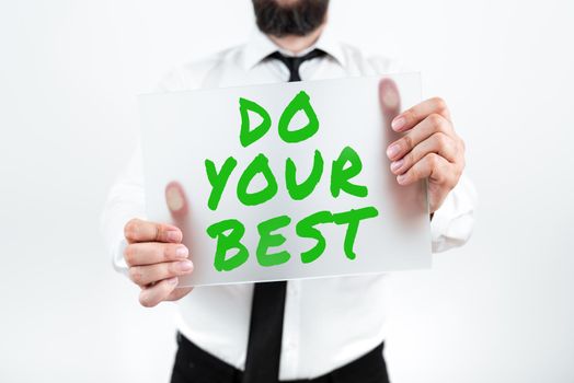 Sign displaying Do Your Best. Business concept Encouragement for a high effort to accomplish your goals Man With Pen Pointing On Digital Target Presenting Strategies.
