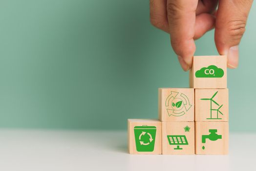 carbon credit net zero green technology eco industry strategy target business concept for environmental development. wood cube block icon on background.