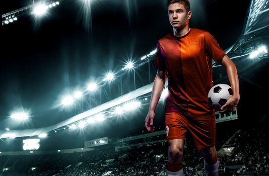 Teenager - soccer player. Man in football sportswear after game with ball. Sport concept.
