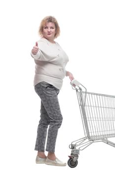 full-length. casual adult woman with shopping cart.