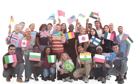in full growth. funny diverse people with their national flags . isolated on a white background