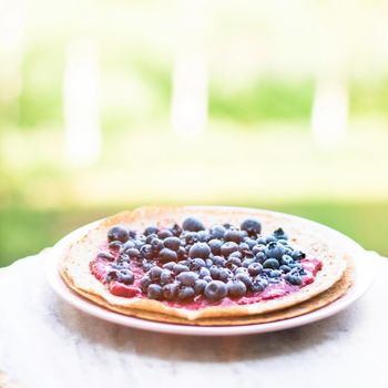 pastry dessert with blueberries - rustic cuisine recipes concept