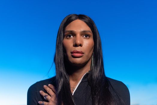 Portrait of a transgender woman looking to the horizon