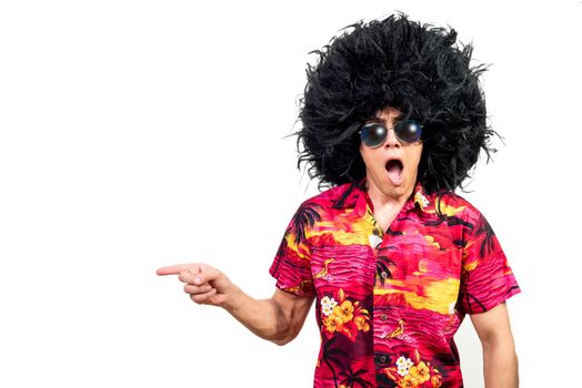 Astonished man in Afro wig pointing away