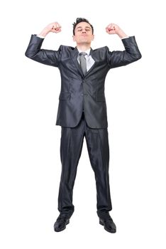 Cheerful businessman showing strength in studio. White background.