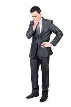 Puzzled businessman in suit thinking on problem. White background.