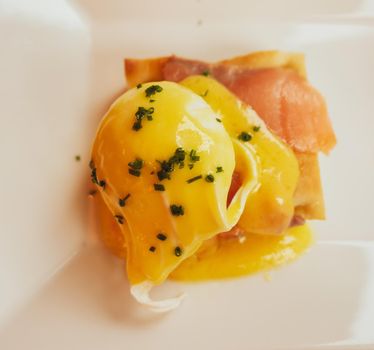 Poached egg with salmon for brunch in a luxury restaurant