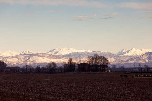 View of the Italian countryside with alp mountains on the background