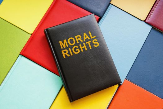 Books and book about moral rights on them.