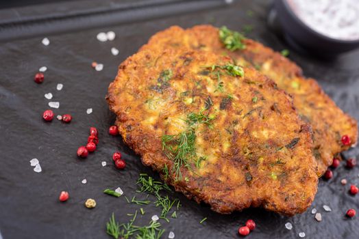 MUCVER. Traditional Turkish Zuccini Mucver. Mucver is a Turkish fritter or pancake, made from grated zucchini.