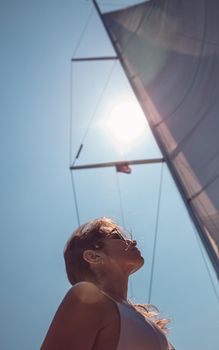 Pretty Girl Traveling on Sailboat