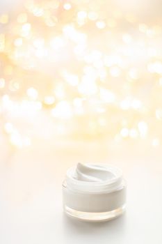Luxury face cream jar and holiday glitter
