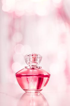 Perfume bottle on glamour background, floral feminine scent, fragrance and eau de parfum as luxury holiday gift, cosmetic and beauty brand present