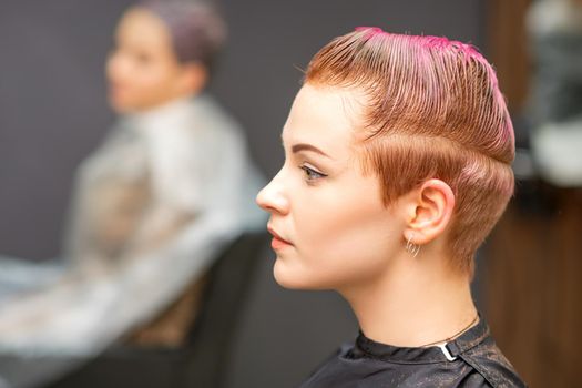 Woman with short haircut in salon