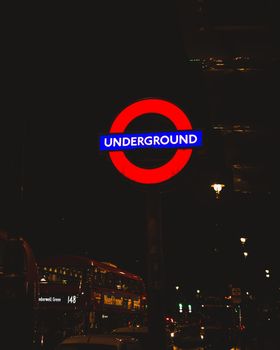 London Underground sign at night