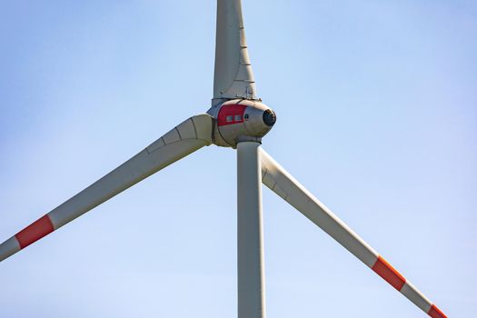 A huge propeller of a windmill as part of a wind farm to generate green electricity