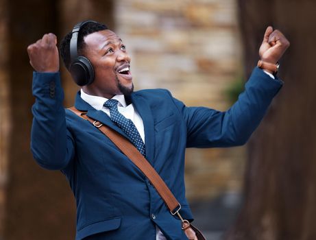 Businessman, happy and headphones of a worker or employee enjoying wireless connectivity in the outdoors. Excited, social and man listening to 5g connection to music in advertising mockup background.