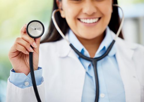 Healthcare, medicare and hospital planning by doctor holding stethoscope, excited to help, diagnose and cure disease. Health care professional happy and ready for medical appointment or consultation