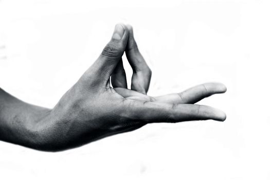 Close up shot of male hand demonstrating Prana Yoga Mudra isolated over white background. Horizontal shot.