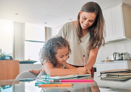 Family doing homework in notebook, mother helping child with school work at home and doing class project for education in books. Creative girl writing for learning and planning schedule in journal