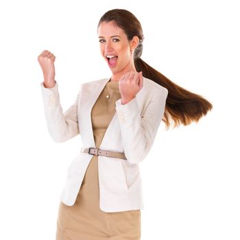 Winning at business. Studio portrait of a young businesswoman cheering solated on white.