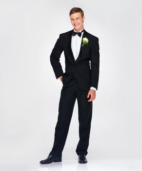 Happy groom, in tuxedo at wedding or man in portrait with a smile on his face. Husband, classy and luxury tux or suit at an event or fashion studio with mockup or copy space background.