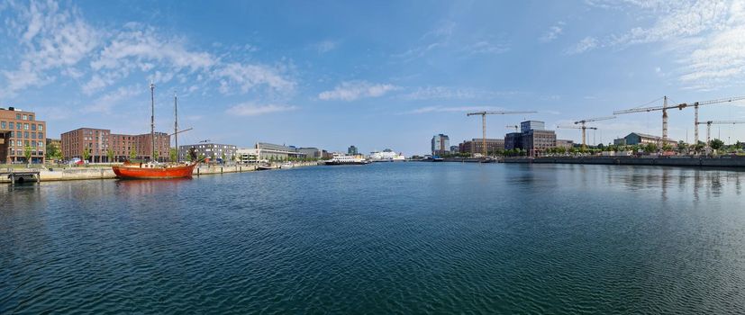 Kiel, Germany - 13.August 2021: Panorama of the port of Kiel in Germany on a sunny day.