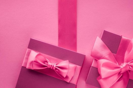 Pink gift boxes, feminine style flatlay background