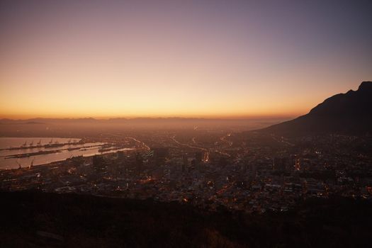 Sunrise over the city. Aerial view of a beautiful city at dawn.