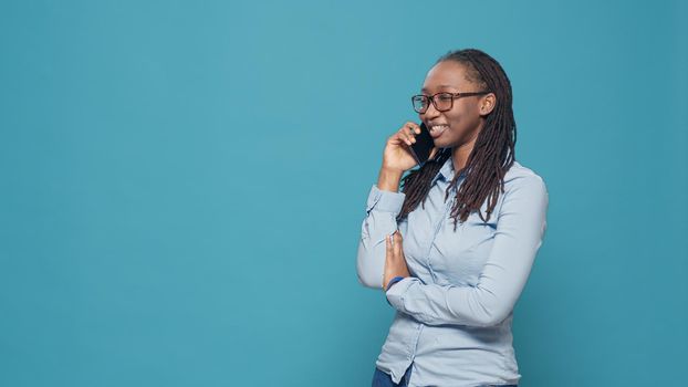 African american woman talking on telephone line