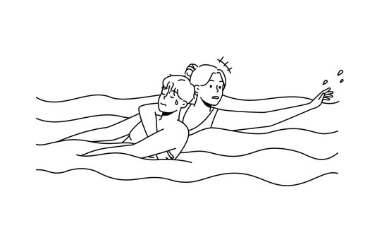 Woman saving man drowning in water