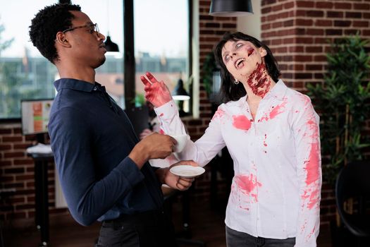 Aggressive zombie chatting with man in office