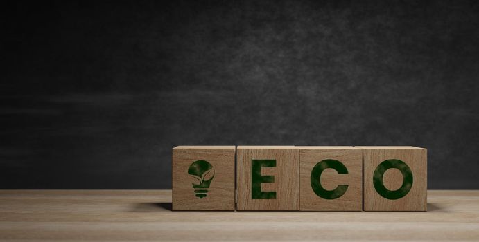 ECO written on wooden blocks, environmental,Creative concept, Connecting with nature and social good in a dark background