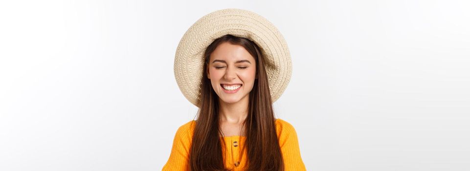 Attractive happy woman preparing for summer vacation on white.