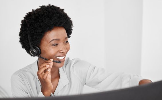 Call center consultant in communication online on computer, consulting with people on the internet and support in customer care job at telemarketing company. Happy African receptionist on phone call.