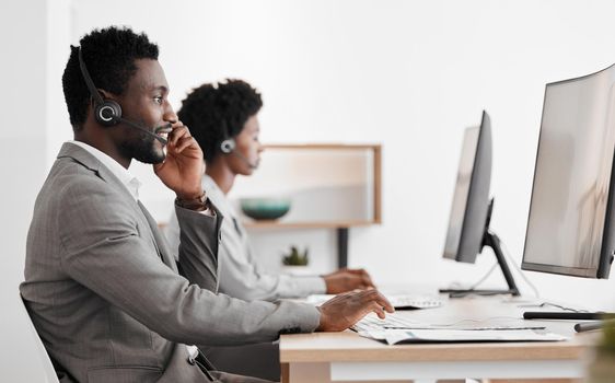 Support, consulting and a black man and woman in call center with headset and computer, help in customer service. Crm, telemarketing and sales for corporate communication employee talking on phone