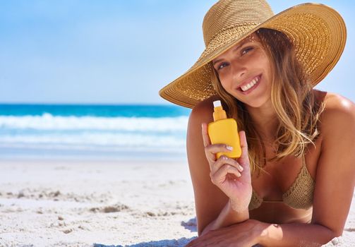 Get sun kissed the smart way. an attractive young woman enjoying a vacation at the beach.