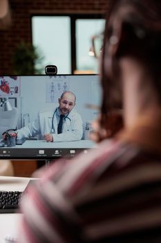 Patient talking with doctor on videocall, medical specialist consultation