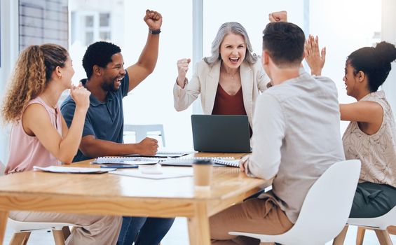 Business people celebration meeting goal, target and success while cheering during a meeting in a office. Advertising and marketing team happy about company profit and bonus salary from project