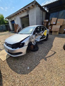 Tbilisi, Georgia - July 26, 2022: Broken gray Volkswagen sedan taxi car.